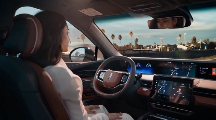 A person is shown driving hands-free on the highway with available Lincoln BlueCruise technology. | West Point Lincoln of Sugar Land in Houston TX