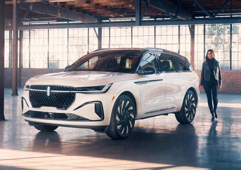 A person approaches a 2024 Lincoln Nautilus® SUV. | West Point Lincoln of Sugar Land in Houston TX