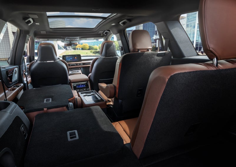 The interior of the 2025 Lincoln Aviator® SUV is shown with two seats folded down for added space. | West Point Lincoln of Sugar Land in Houston TX