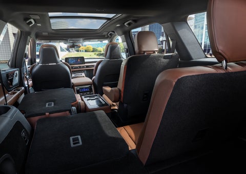 The interior of the 2025 Lincoln Aviator® SUV is shown with two seats folded down for added space. | West Point Lincoln of Sugar Land in Houston TX