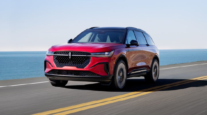 A 2025 Lincoln Nautilus® SUV is being driven on a seaside roadway. | West Point Lincoln of Sugar Land in Houston TX