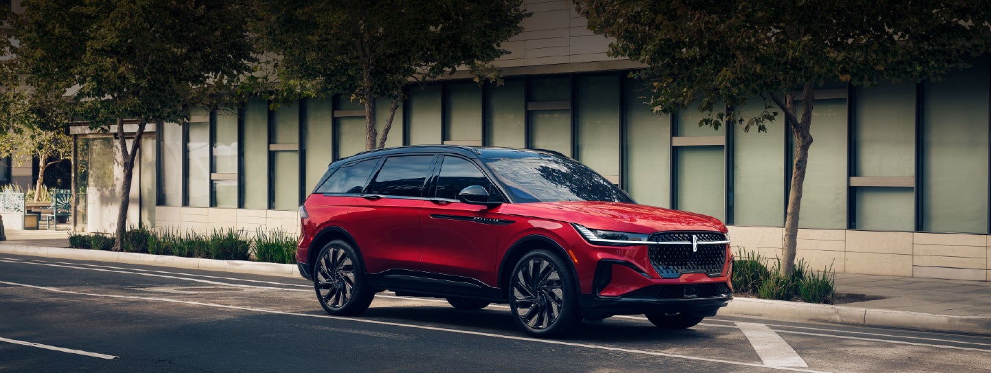 A 2025 Lincoln Nautilus® SUV with an available hybrid powertrain is parked in an urban setting. | West Point Lincoln of Sugar Land in Houston TX