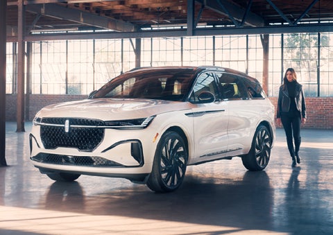 A person approaches a 2026 Lincoln Nautilus® SUV. | West Point Lincoln of Sugar Land in Houston TX