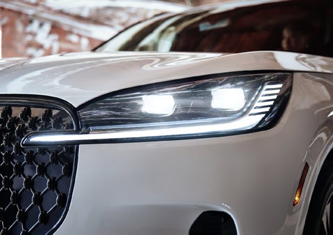 A close-up of a headlamp on the 2027 Lincoln Aviator® SUV is shown. | West Point Lincoln of Sugar Land in Houston TX