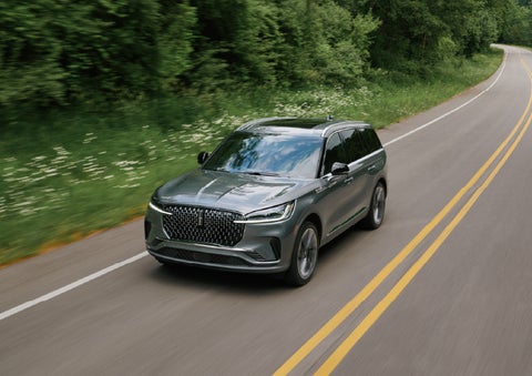 A 2027 Lincoln Aviator® SUV is being driven down a road. | West Point Lincoln of Sugar Land in Houston TX