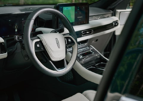 The leather-trimmed steering wheel of a 2027 Lincoln Aviator® Black Label™ SUV. | West Point Lincoln of Sugar Land in Houston TX